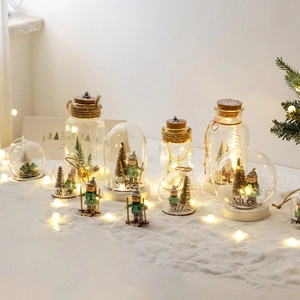 Christmas glass snow globe with LED reindeer landscape and warm glowing micro lights