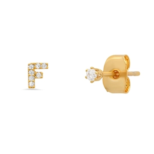 Detail of gold S925 silver stud earrings featuring a crystal letter F and a single zircon