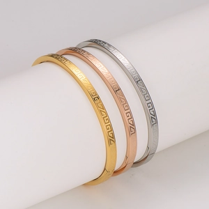 Classic maze pattern bangle set in gold, rose gold, and silver finishes for couples