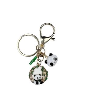 Cute cartoon panda keychain with bamboo leaf charms and golden metal keyring