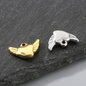 Polished stainless steel heart pendant with angel wings in gold and silver finish