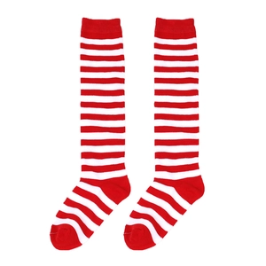 Macro detail of red and white striped knit texture on over-the-knee Christmas socks