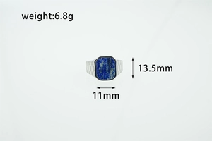 Macro detail of men's square lapis lazuli ring with engraved checkerboard texture sides