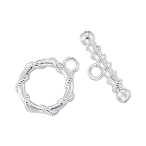 Macro view of silver-toned spiral texture toggle clasp and T-bar for DIY jewelry making