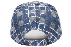 Detail view of the blue denim baseball cap with silver sequin diamond patterns and buckle