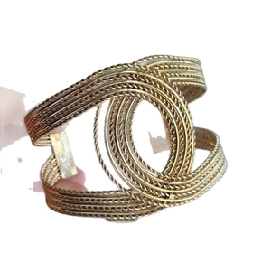 Vintage gold twisted rope cuff bracelet with classic double C interlocking design