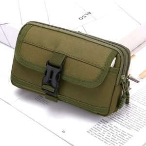 Close-up of green tactical nylon phone holster with buckle and dual zippers on a book