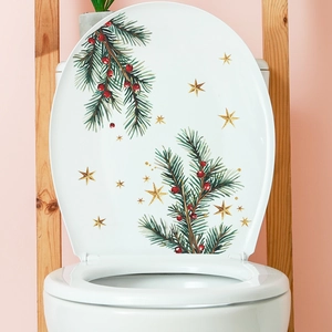 Christmas toilet lid sticker featuring pine branches, berries, and stars decor