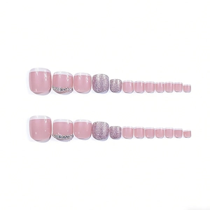 24-piece short French press-on toenails with glitter and silver rhinestones in pink