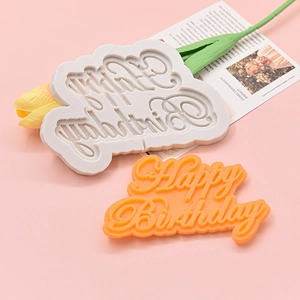 Silicone Happy Birthday cake mold set with decorative flowers on pink background