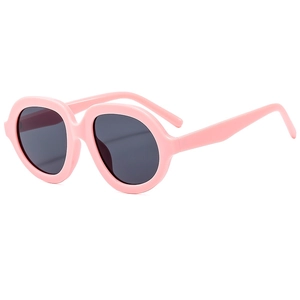Occhiali da sole rotondi oversize rosa con montatura spessa e lenti scure da donna