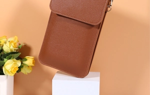 Brown litchi grain PU leather touchscreen phone bag with flip cover and metal hardware