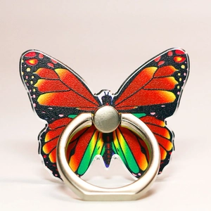 Detail of colorful butterfly phone ring grip with a rotating silver metal kickstand