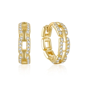 Macro shot of gold-plated chain link hoop earrings with sparkling pave zircon stones