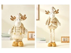 Detail of Christmas reindeer plush dolls with retractable legs and festive sequins