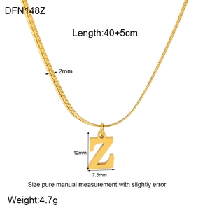 Macro shot of gold 18K plated Z-letter pendant with 40+5cm flat snake bone chain dimensions
