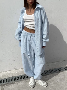 Light blue striped two-piece set with long sleeve shirt and drawstring wide leg pants