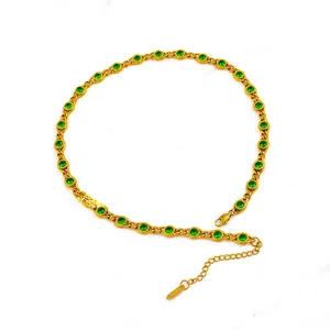 Detail of 18K gold-plated necklace with green cubic zirconia and lobster clasp