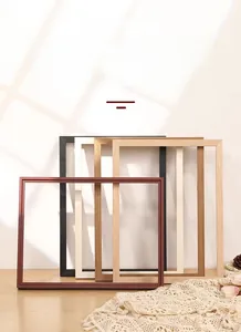 Close-up of minimalist solid wood frames with natural texture in various finishes