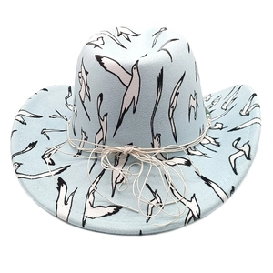 Detail of light blue western felt hat with bird prints and beige rope buckle