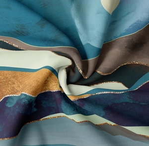 Macro detail of abstract fluid wave pattern fabric with gold metallic outlines