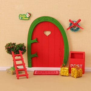 Miniature Christmas elf door set with mailbox, tree, and festive wooden accessories