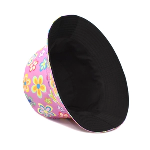 Detail showing reversible floral pattern exterior and black interior lining of sun hat