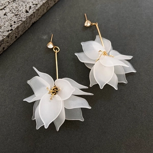 Elegant gold flower tassel earrings with white frosted petals and zircon accents