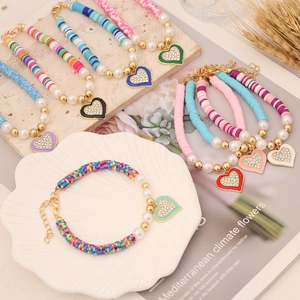 Bohemian Handmade Polymer Clay Heishi Beaded Bracelet With Rhinestone Heart Charm And Faux Artificial Pearl Adjustable For Women