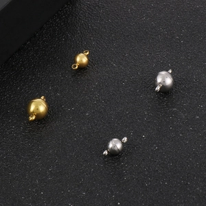 Detail showing gold and silver magnetic sphere clasps for DIY jewelry making