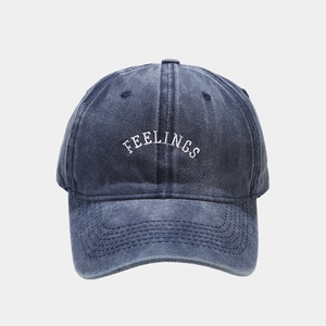 Retro washed denim baseball cap with white Feelings embroidery in navy blue color