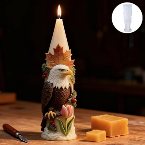Silicone mold for DIY eagle and autumn leaf relief candle on dark wood background