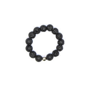 Detailed close-up of 4mm black lava stone beads and silver metal bead on elastic ring