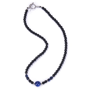Detail of 6mm obsidian and tiger eye beaded necklace with silver clasp on white background
