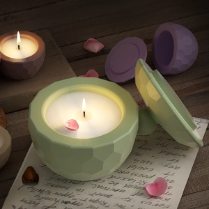 Close-up of geometric honeycomb textured candle jars on vintage wooden desk setting