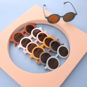 Modern round kids sunglasses in seven Morandi colors with matte frames and dark lenses