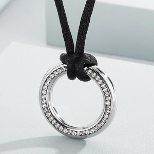 Chic silver round pendant necklace with sparkling crystals and black cord strap