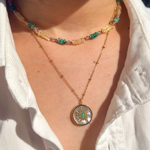 Layered gold necklace set with natural colorful stone beads and white shell sun pendant