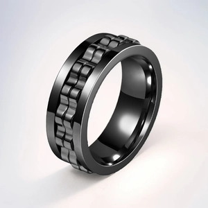 Close-up view of the black titanium steel spinning gear ring for anxiety relief.