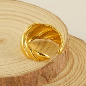 Polished 18k gold plated stainless steel open ring with a spiral textured shell design