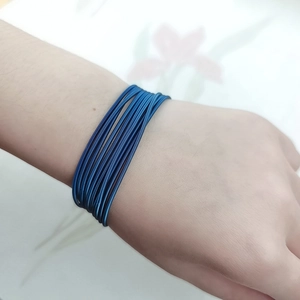Blue multilayer 304 stainless steel spring wire wrap bracelet on wrist