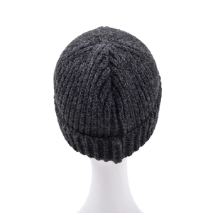 Close-up of thick rib-knit texture on a dark grey winter beanie for men and women
