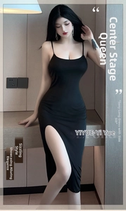 Detail of a sleek black slim-fit dress with high side slit and thin spaghetti straps
