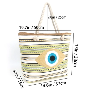 Detailed size chart of evil eye canvas tote bag with striped pattern and rope handles