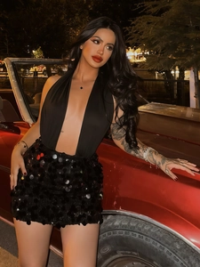 Sexy black deep V-neck halter top and sequined mini skirt set with round sequins