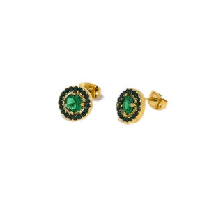 Golden round halo stud earrings with emerald green cubic zirconia on white background