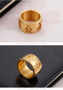 Macro detail of gold-plated double-layer ring with hollow boy and girl silhouette cutouts