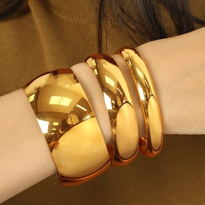 Polished gold titanium steel cuff bracelets set for women with mirror finish shine