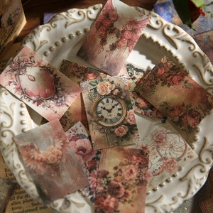 Vintage scrapbooking material paper with roses and clocks on a white embossed plate