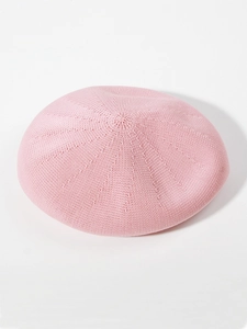Detailed knit texture and soft pink yarn pattern of this breathable linen beret